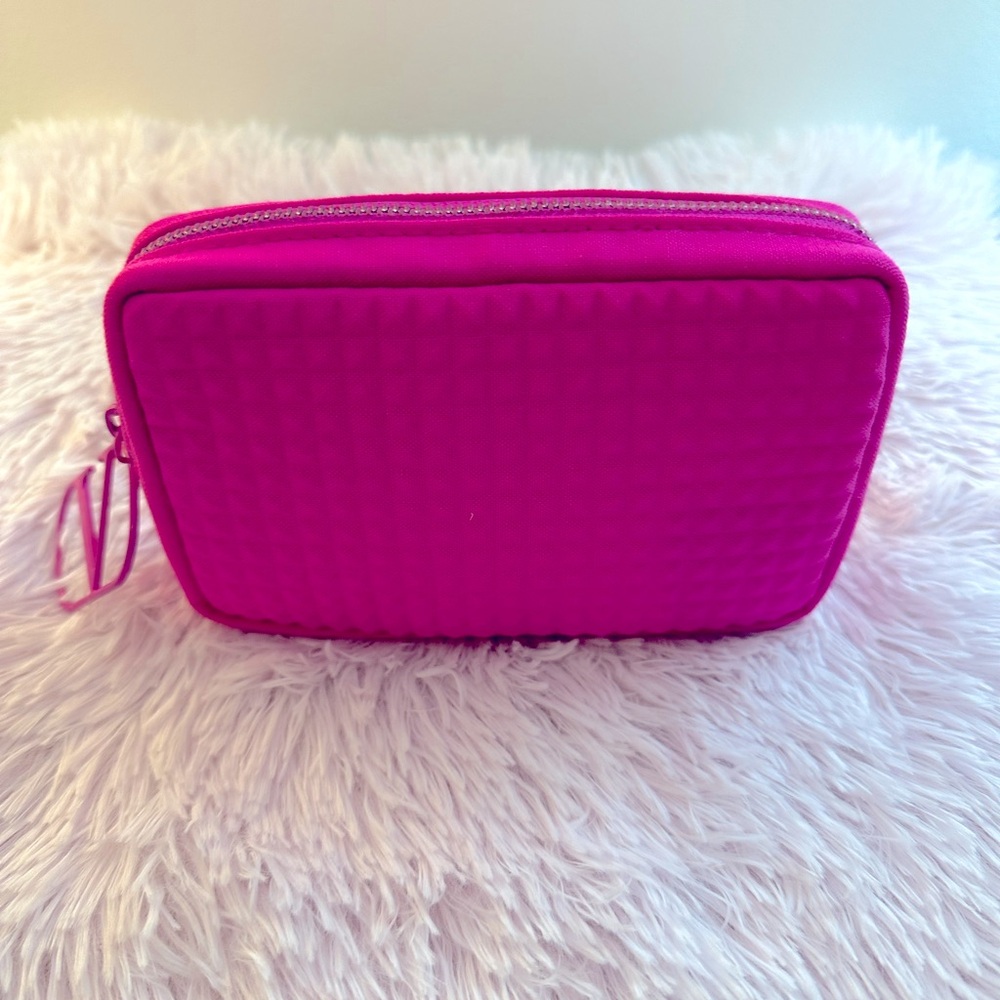 Valentino beauty bag with V logo zipper charm